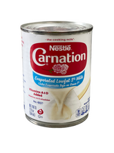 Load image into Gallery viewer, Nestle Carnation Low Fat 2% 12oz.
